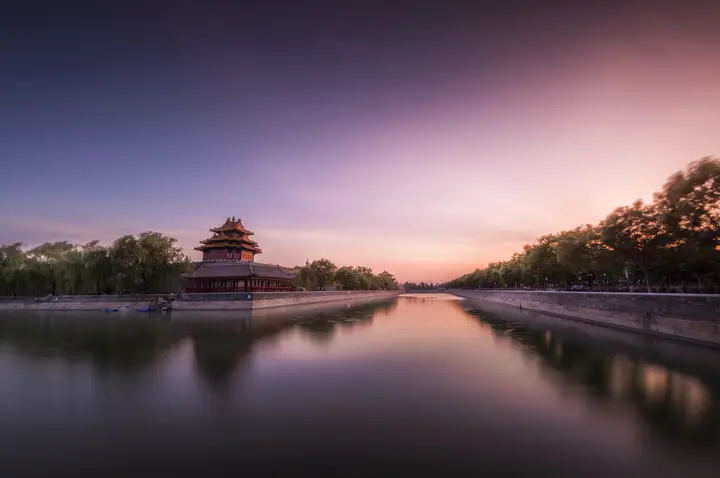 Corner tower of the Forbidden City at dusk