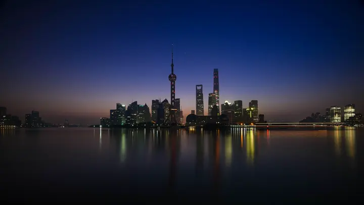 Pudong skyline across the Huangpu River at dusk